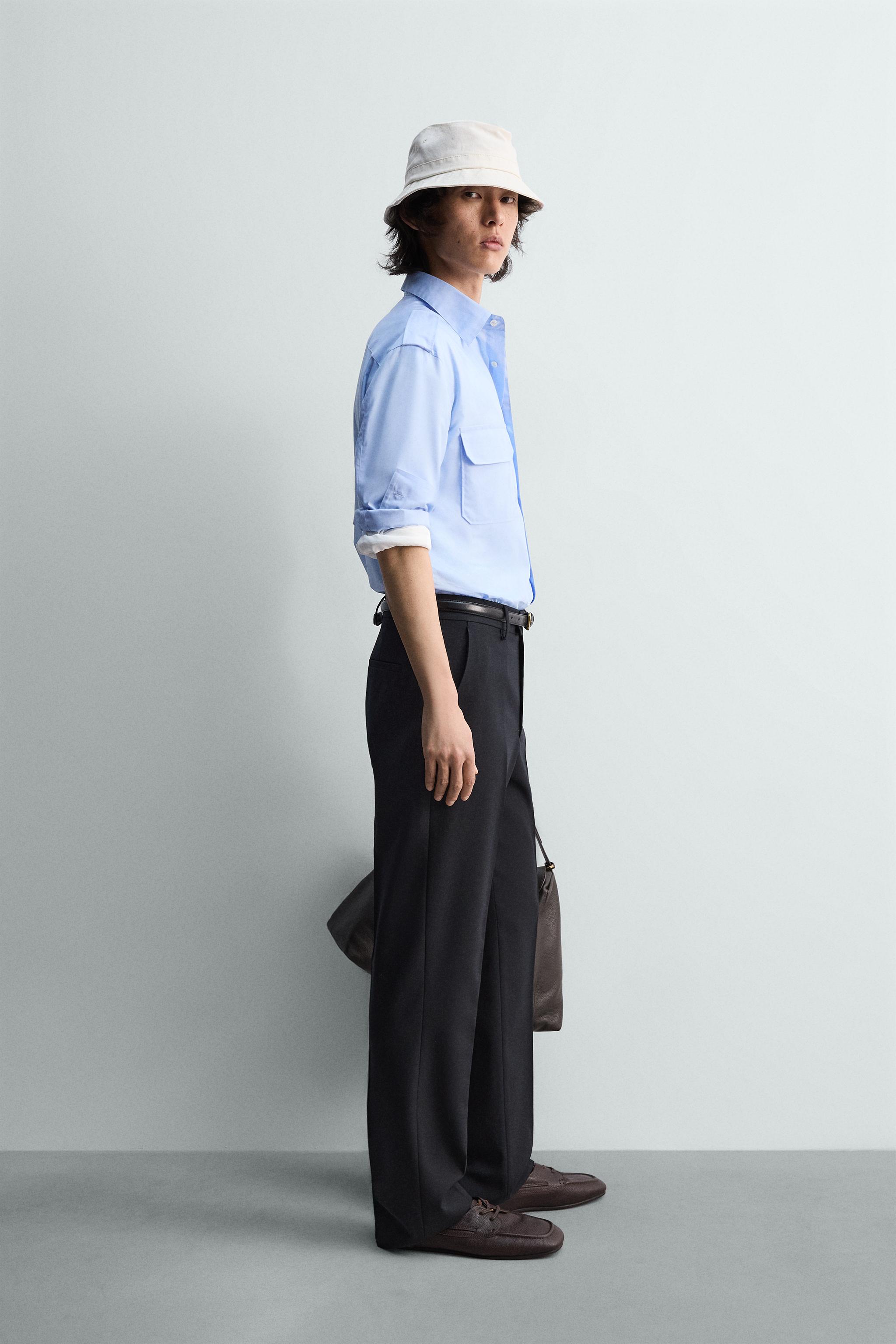 CHEMISE À POCHES ET PATTES